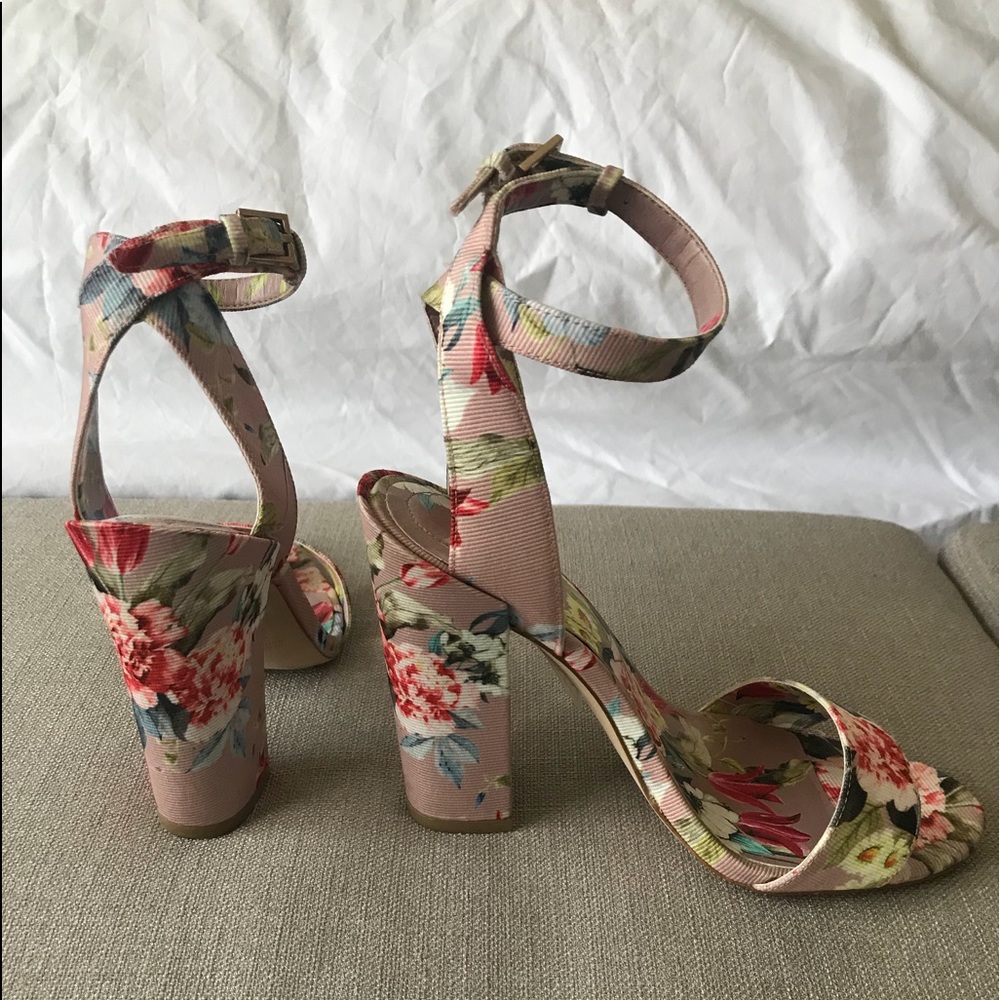 Floral stacked heel sandal.